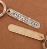 Colgante de llavero de diamantes de autom￳vil con una placa de tel￩fono anti-perdida placa de tel￩fono macho y mujer colgante de llave exquisita