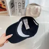 Diseñador de moda Gorra de béisbol Pareja Otoño Invierno Cálido algodón Letras casquette