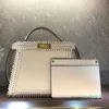 2022 nuova moda Borse da sera Borsa da donna Tote Borse a tracolla di alta qualità Borse a tracolla di moda Pacchetto in pelle intrecciata a mano Iconici twist lock Due com top