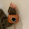 Flickor axel handväska mode baby läppstift handväska mini crossbody kedjepåsar fabrikspris