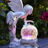 Dekorativa föremål Figurer LED Solar Angel Harts Lamp Statue Utomhusdekoration Ornament Lysande Elf Girl Garden Crafts Flower Fairy 220928