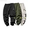 Nya joggingbyxor Cargo Byxor för män Casual Hip Hop Pocket Man Byxor Träningsbyxor Streetwear Ribbons Techwear Byxor