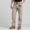 Pantaloni tattici da città da uomo Pantaloni multitasche elastici Pantaloni cargo da combattimento militare Pantaloni in cotone SWAT Army Slim Fat Pantaloni casual 5XL