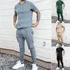 Tute da uomo Tuta sportiva da uomo T-shirt Pantaloni a maniche corte Abbigliamento da allenamento Set da 2 pezzi Casual Stampa tinta unita allentata Abbigliamento sportivo maschile G220927