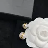 Projektantki kolczyki kolczyki dla kobiet perłowe kolczyki moda złote kolczyki biżuteria męskie luksurys hoop kolczyki akcesoria 220R