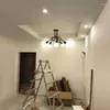 Lámparas colgantes Lámparas de curvas modernas nórdicas Hierro forjado Chapado en oro Luces colgantes creativas para iluminación de sala de estar de restaurante