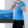 Camisetas sin mangas para hombres Secado rápido Mangas cortas para hombres Camiseta suelta para correr Ropa para correr Parejas femeninas de media manga Camiseta vestida Deportes de verano