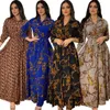 Sukienki swobodne modne francuskie eleganckie dla kobiet lato retro druk muzułmański Dubai Abaya Lapel z pojedynczą koszulą Długie rękawie sukienka