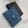 Небольшой сафанский кожаный кошелек слоты кредитные карты счета счета в отделении документ карман эмалированный металлический треугольный логотип