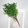 Dekorativa blommor Plastiska och växter buntar simulering grön utomhuslayout grönande projekt matsal hem levande
