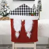 Крышка стулья рождественское покрытие на стол обратно рождественский ужин наборы наборов шляпы для дома украшения