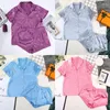 Huiskleding stevige kleur satijnen pyjama's met shorts slaapkleding pak zijden pyjama voor vrouwen korte mouw casual pyjama sets woonkleding lente