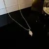 Kettingen kwamen aan dat roestvrijstalen goudkleur kleine kristallen kettingen voor vrouwen Valentijnsdag romantische zirkoonbladeren hangers sieraden