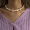 Collana con perline in filo di perle rotonde alla moda punk d'oro per donna Collare per clavicola di perle corte fatto a mano da sposa