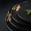 Talerze ceramiczne czarne i złoty okrągły zachodni stek talerz Wysokiej klasy restauracja deser sałatka owocowa
