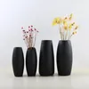 1 stücke Moderne Einfache Schwarz Farbe Keramik Vase Retro Container Europäischen Handgemachte Handwerk DIY Hause Wohnzimmer Garten Dekoration1