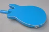 La guitare basse électrique semi-creuse bleue à 4 cordes avec touche en palissandre peut être personnalisée