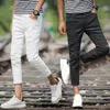 Herenbroek groothandel 2022 mode casual hiphop tieners scheurde jeans slanke elastische voeten zomer jeugdstudenten harembroeken