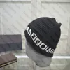 Warme merkwanties voor vrouwen heren winterontwerper gebreide petten luxe beanie straathoeden motorkap zwarte witte schedel pet