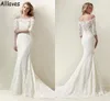 Ivory Full Lace Mermaid Wedding Gowns With Half Sleeves Boat Neck Sweep Train Bohemian Bridal Dress Buttons Back Vintage Chic Brides Robes de Mariee CL0895