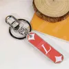 bai cheng Fashion Designer Keychain Skateboard Stainless Steel Luxury Women Men Designers Keyring Car Keychains Lovers Key Rings Bag Pendant 3 Colors