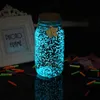 Jouets 10g partie diy particules super lumineuses fluorescentes lueur pigment brillant gravier nuit sable brillant dans la poudre de sable noir 2023