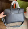 مصممي حقيبة الرجال حقيبة الكمبيوتر المحمول أكياس الأعمال الحزمة الصلبة لون اليدين جلدية عالية السعة الكتف حقائب اليد متعددة الاستخدامات