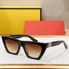 Neueste modische Cat-Eye-Sonnenbrille 2022 Herren Designer Luxusmarke kleines Monstermuster Damenbrille 0445 schwarzes Acetat braune Linsen Niete occhiali da sole