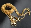 Catene di serpente placcate oro 18 carati da 1 mm Collana con chiusura a moschettone liscia dorata da 16-30 pollici per donna