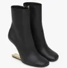 Branca de inverno First Women Boot de tornozelo nu preto preto nappa couro em forma de F em forma de Fotas de metal de cor dourada de cor de ouro