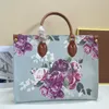 Kvinnor Tygväska axelväskor Fashion Letter Floral Printing Stor kapacitet Rese Shopping Handväskor äkta läderhandtag Interiörens dragkedja Pocket Totes Purse