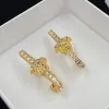 Luxe Conçu Mesdames Dangle Lustre Diamants Boucles D'oreilles Banshee Medusa Tête Portrait Plaqué Or 18K Femmes Gland Boucle D'oreille Designer Bijoux 9009