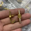 LUZUGHS Projetos de damas penduradas Brincos de diamantes de candelabro Banshee Medusa Retrato de cabeça 18K Prazado de ouro Jóias de designer de brinco femininas 9009