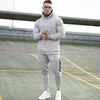 Herrsportdräkt Märke KLÄDER Män Tracksuit Set Sweatshirt Muscle Men Hoodiespants Set Gym Running Suit 220819