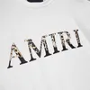 T Sleeve Amiiriis Mens Shirt Short Tshirt Designer 24ss Leopard Lettered Printed Couple T-shirt F UFMR