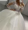Robe de mariée arabe Dubaï Robes de bal de bals paillettes en tulle transparent en V perles de mariée robe de Mariee