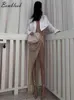 Bomblook C22SK154 2022 Summer New Solid Color Mesh Sheer Bright Silk Twist Irregular Long Skirt Women T220819