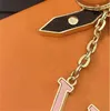 Bai Cheng Luxe modeontwerper Key Buckle Car Keychain Handmade Gold Keychains Lovers Men Dames Bag Pendant merkontwerper Keyrings voor dame