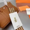 bolsas bolsa de jardim Bolsas de couro de nova camada padrão lichi Alça de ombro larga versátil Bolsa feminina portátil Messenger69