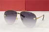 Novos óculos de sol de design de moda 0065s piloto K Gold Meio moldura Decoração de cabeça de animal clássico clássico estilo versátil de estilo UV400 de proteção ao ar livre