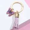 Fashion Oil Drop Butterfly Schlüsselring mit Quastenschlüsselkettenauto -Beutel Anhänger Ornamente Geschenk für Frauen Mädchen Schmuckstück Schlüsselhalter