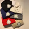 Новая шапочка -дизайнер вязаные шляпы мужчина женский зимний зимний череп шляпа шляпа 6 цветов высшее качество