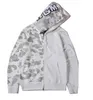 Hommes Femmes Designer Hoodies Jogger Survêtement Pull Sportwear Ras Du Cou Sweat Polaire Blanc Noir Couture Camo Hip Hop Air Luminous Shark Veste M-3XL