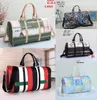 Tasarımcılar Moda Duffel Bags Lüks Erkek Kadın Kadın Seyahat Çantaları Deri Çantalar Büyük Kapasite Holdall Gecede Backp3036