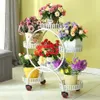 Ucuz Taşınabilir Çiçek Tekerlekler ile Standlar Metal Bitki Tutucu Yaratıcı Çiçek Tepsileri Organizatör Ev Dekoru için Büyük Depolama Rafı210p