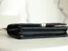 Üst Katman 10A Ayna Kalitesi Lüks Tasarımcılar Mini Saplı Çanta Bayan Gerçek Deri Kuzu Derisi Kapitone Kapaklı Siyah Çanta Omuz Kutusu Çantası Kart Sahibinin Altın Zincirli Cüzdanı