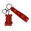 PVC Bear Keeschains Ring Honder Bijoux Carton Fleur Lonyard Chaînes Clé Accessoires Animal Pendant sac Piets à bibelots Coupons de mode mignonne Couvrage de mode pour voiture