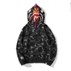 Дизайнер с капюшоном роскошный осень и зимние обезьяны модные акула сшитая ламинированная шляпа карман карман двойной мужчина Женщины на молнии кардиган
