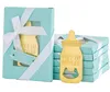 Feest is voorstander van gouden babyflesvormopener in cadeaubakje baby shower doop verjaardag