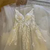 Vestidos de noiva de corpete sem revestimento Apliques de renda sem costas Vestido de nupcial V Robe de problemas na praia de pescoço de mariee